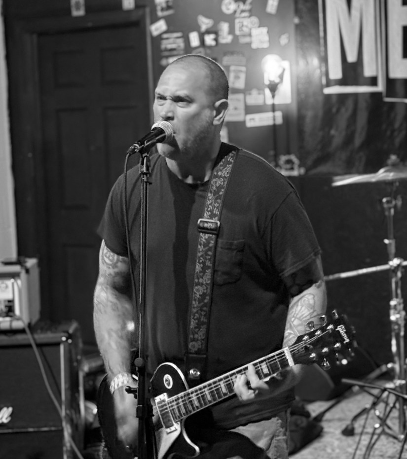 a member of the band the raging nathans from dayton, ohio performs during midwest punkfest