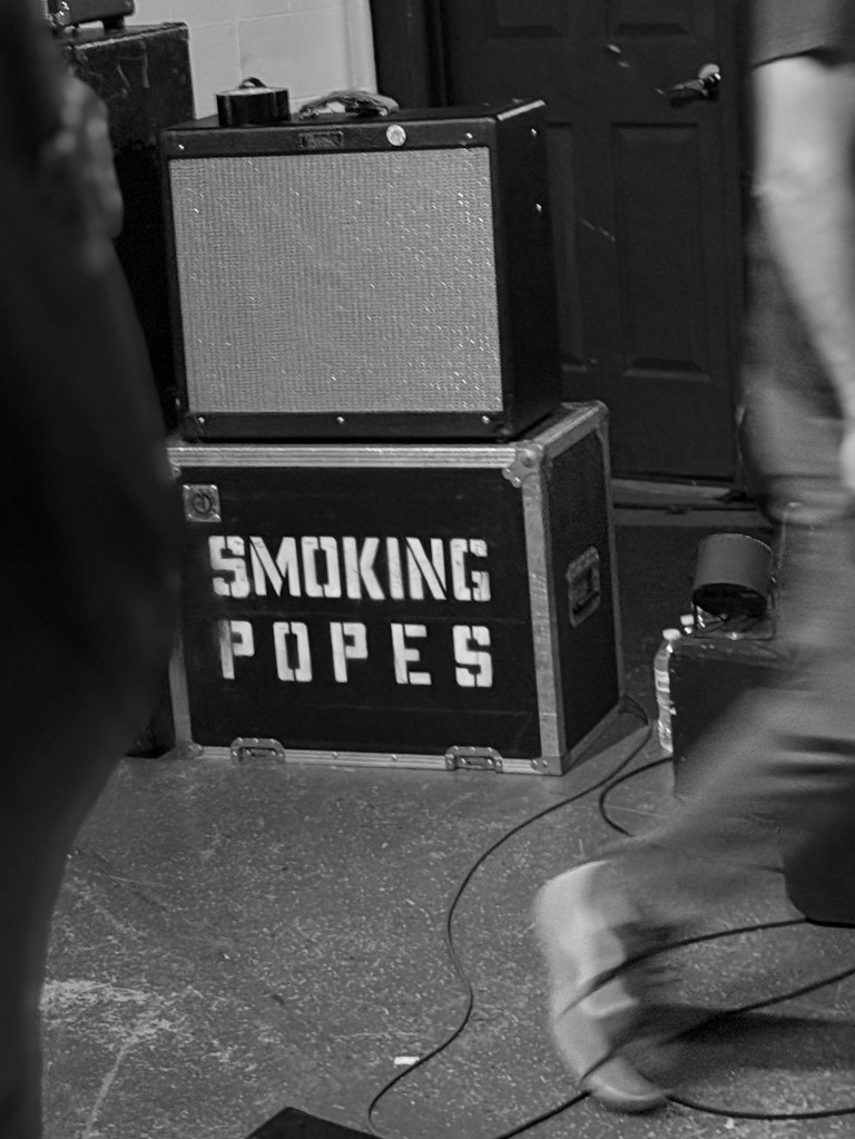 smoking popes road case sitting on stage